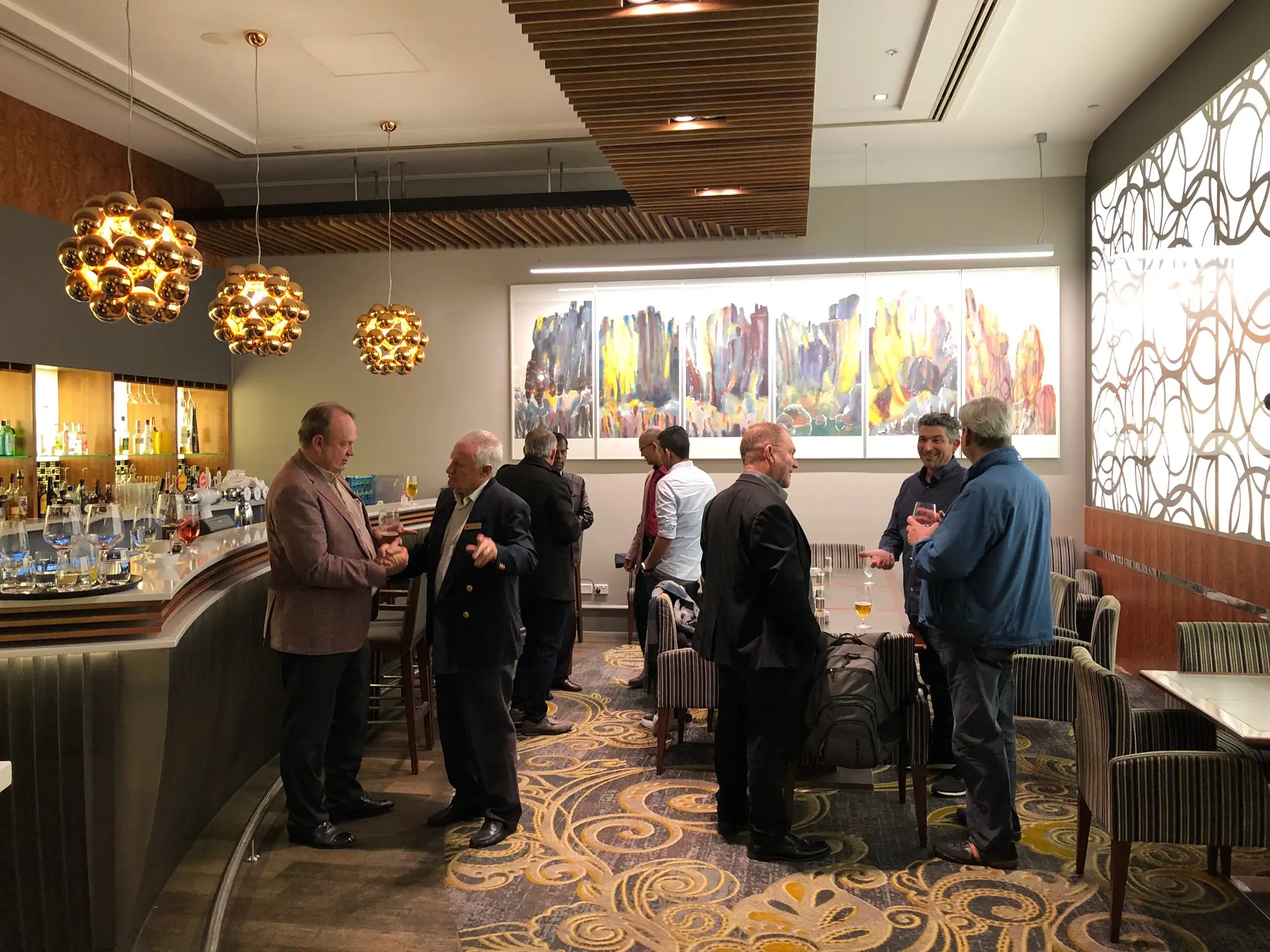 Monthly meeting with private members at a private bar.