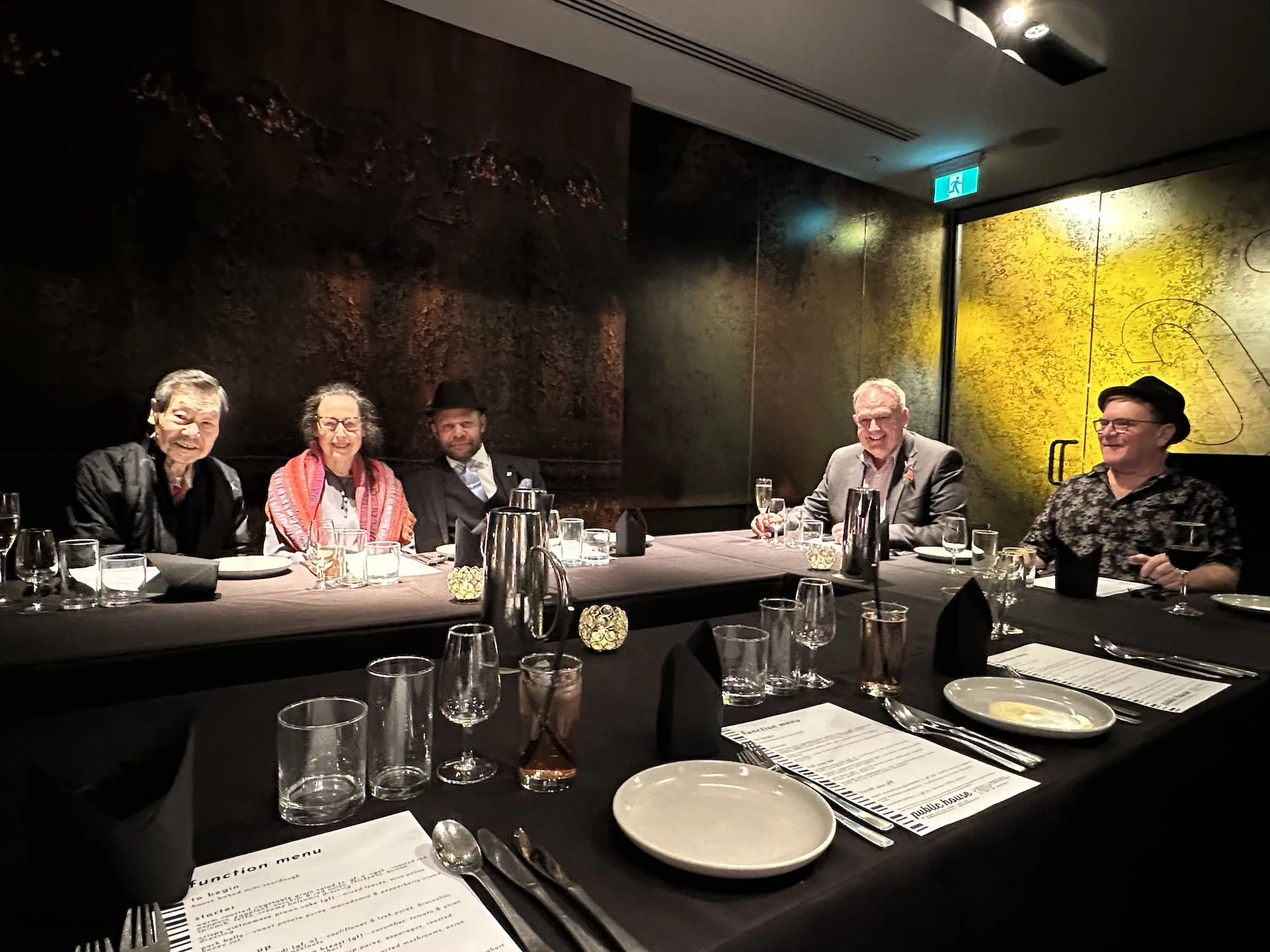 Construction workers from Ideal Built repairing an internal ceiling of a shopping center while on a scissor lift.